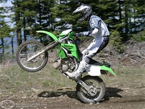 Power  Who says the 220R doesn t have enough power. Chamerlain had a blast ripping off wheelies on the KDX.